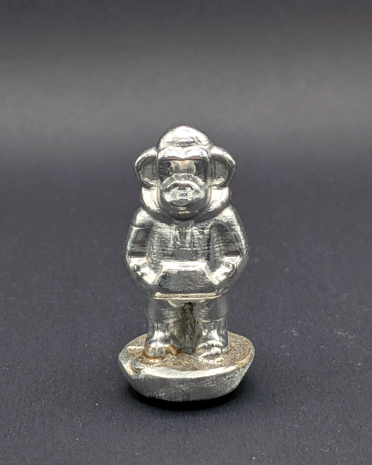 TIN SURVIVORS subject 04 — closing detail, raw cast surface